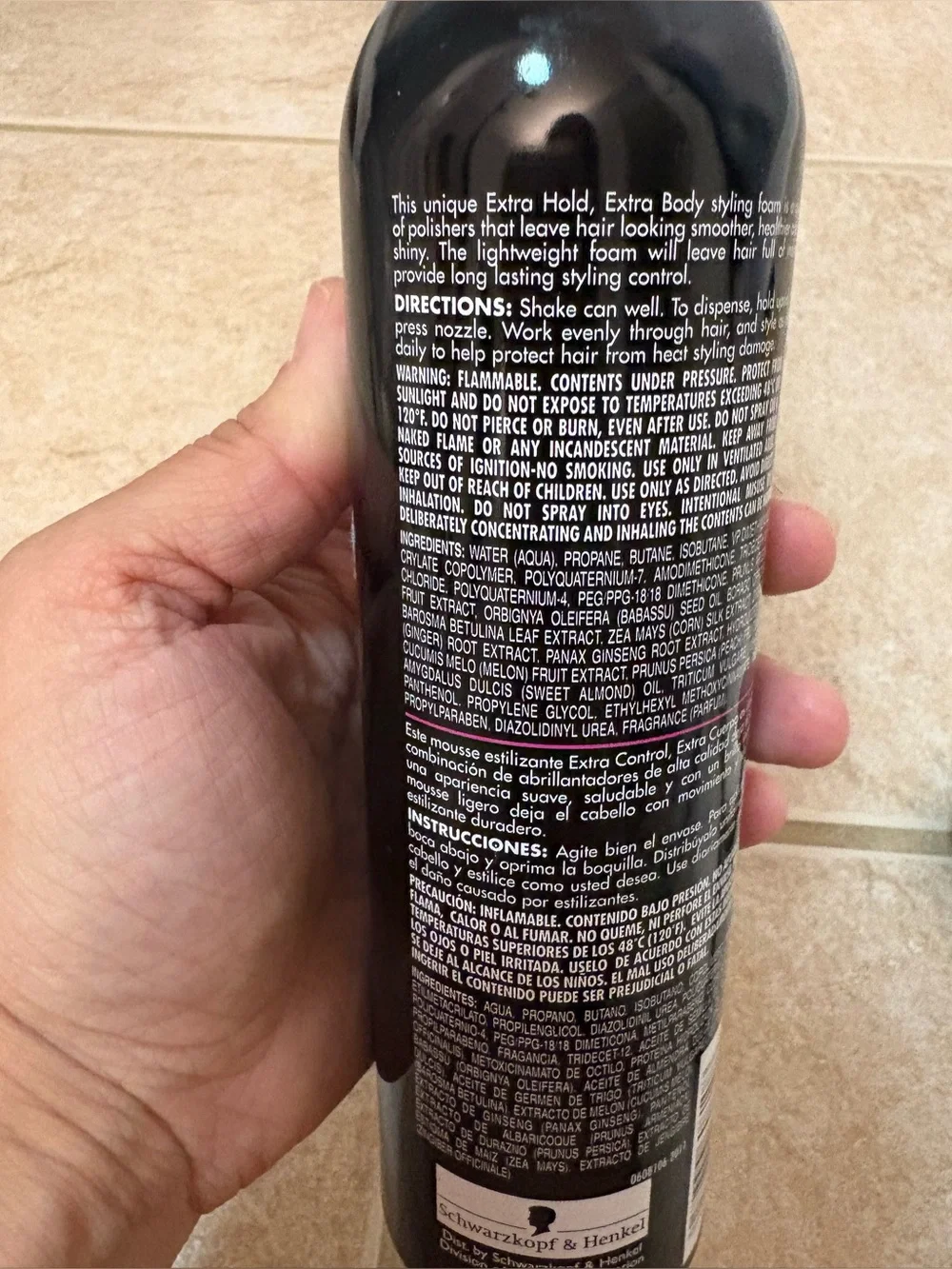 black bottle of Smooth 'N Shine Polishing Extra Hold Extra Body Styling Mousse